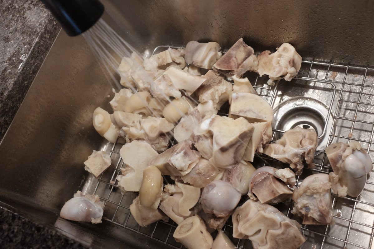 rinsing bones in sink