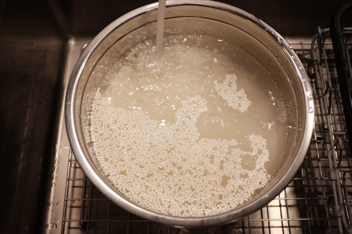 Start of stage 2 for makgeolli: washing rice