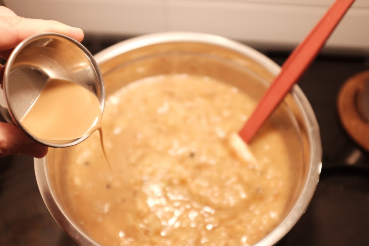 adding liquid yeast to pear mash