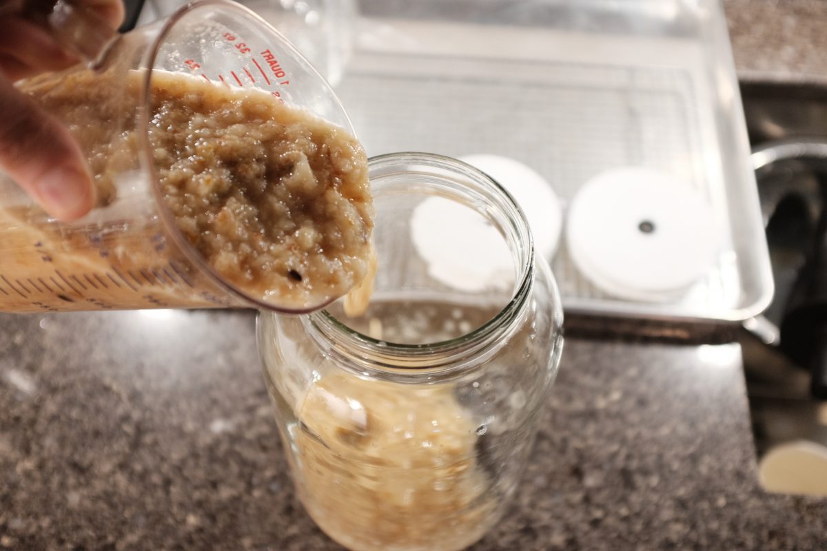 filling jars with mash