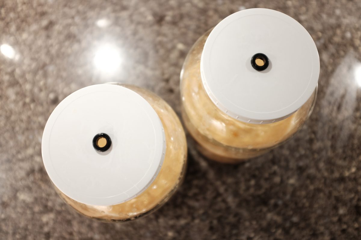 top view of lids showing holes and seals for airlocks