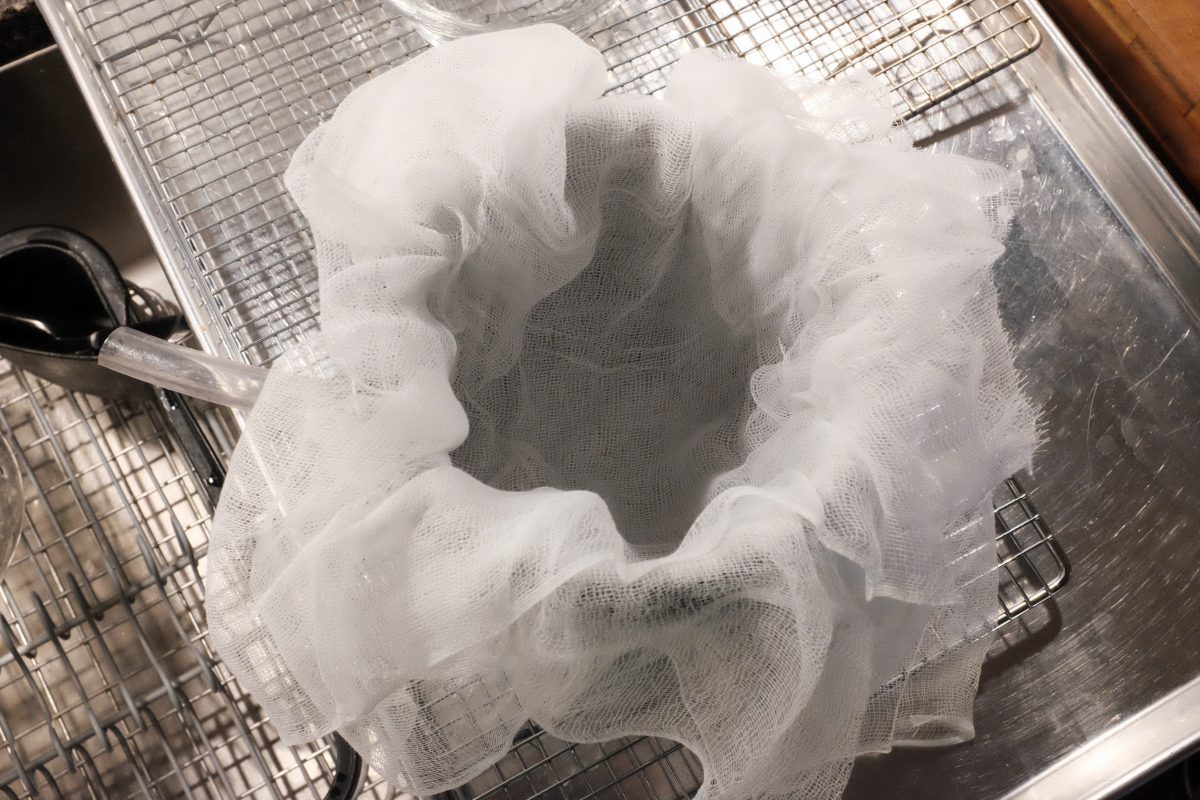 lining press basket with cheesecloth